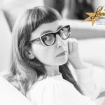 XI Gala Alei Gwiazd Literatury - portret Magdaleny Grzebałkowskiej i logo Alei Gwiazd Literatury